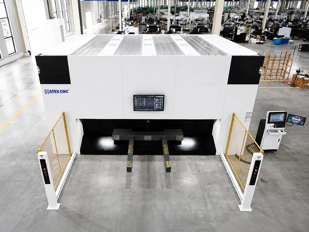 Top view of the 3D 5-axis fiber laser cutting machine with rotary exchange worktable Top view of the 3D 5-axis fiber laser cutting machine with rotary exchange worktable