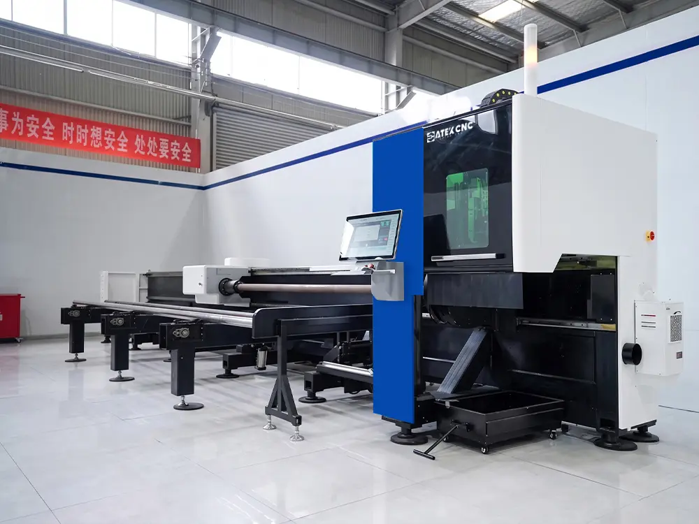 Front left view of the 2-chuck fiber laser tube cutting machine with feeding system Front left view of the 2-chuck fiber laser tube cutting machine with feeding system