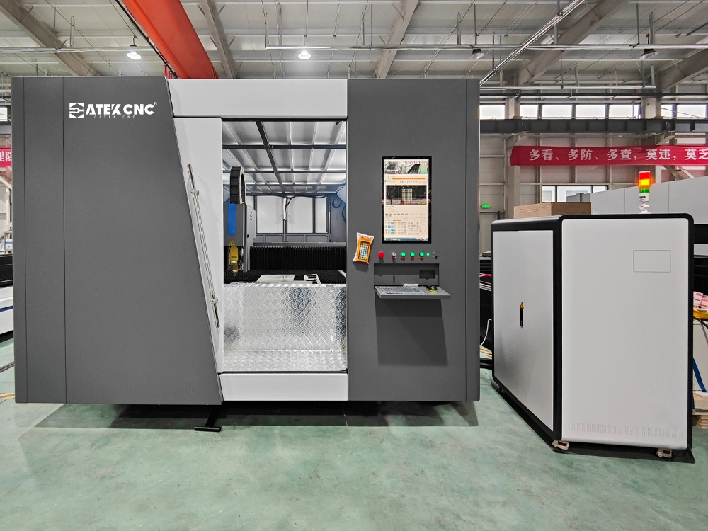 The 2040 enclosed fiber laser cutting machine with dual-shuttle table when the door open