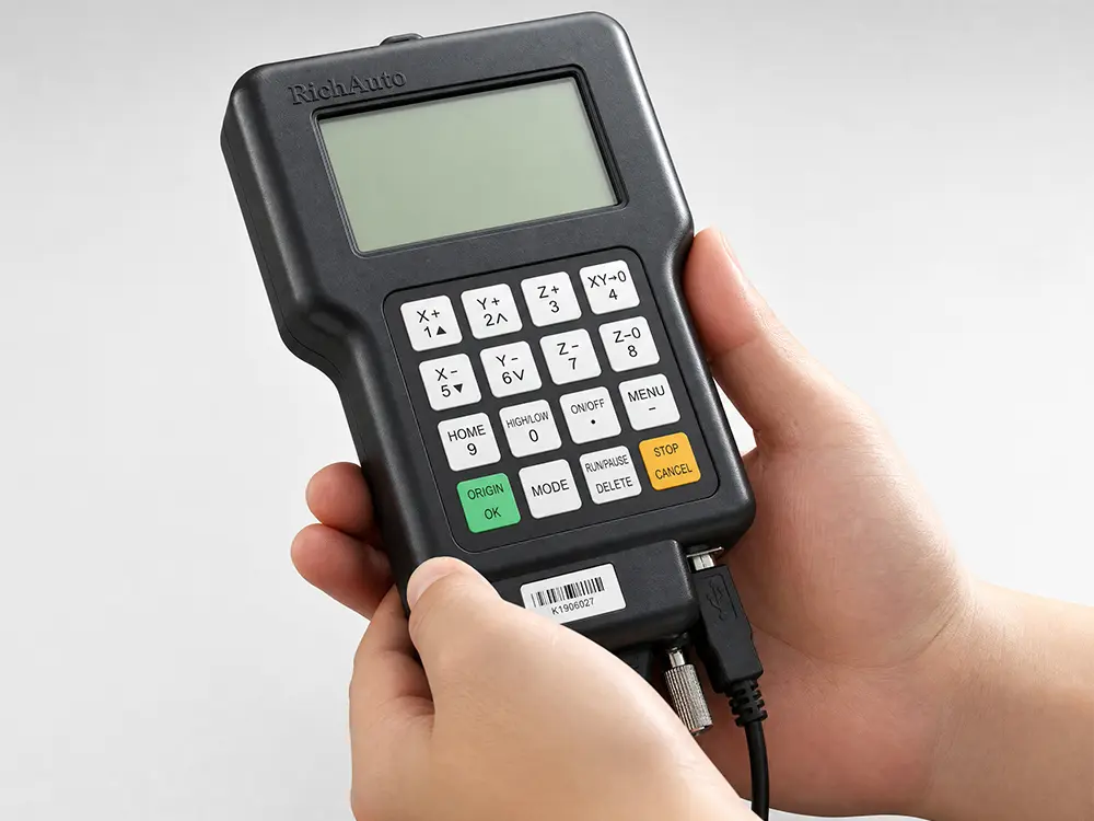 Optional DSP Hand Controller Optional DSP hand controller for a desktop CNC router, enabling convenient offline operation and precise CNC control