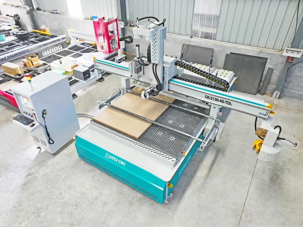 Top view of the 4-axis swivel head ATC CNC router with auto-labeling device and drilling bank