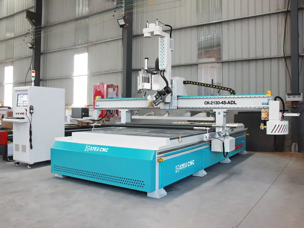 Front left view of the 4-axis swivel head ATC CNC router with auto-labeling device and drilling bank