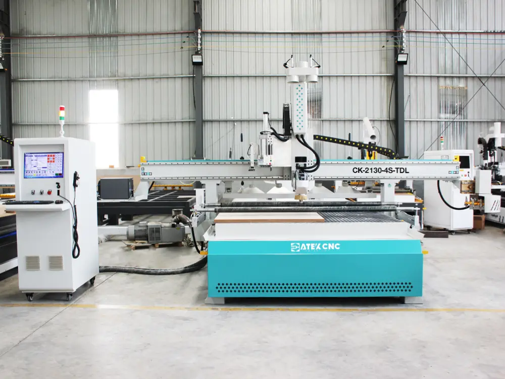 Front view of the 4-axis swivel head ATC CNC router with auto-labeling device and drilling bank