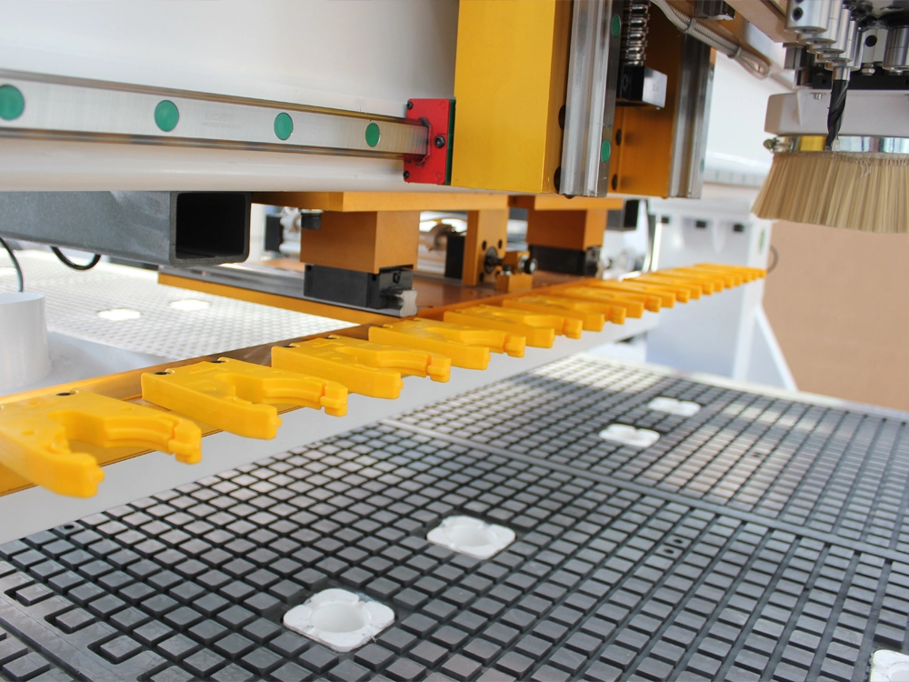 Linear tool changer for CNC router