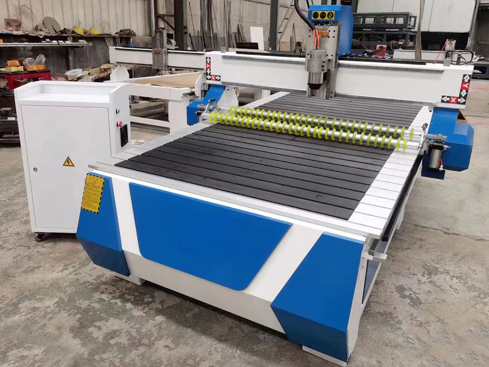 CNC wood router with pneumatic pressure roller