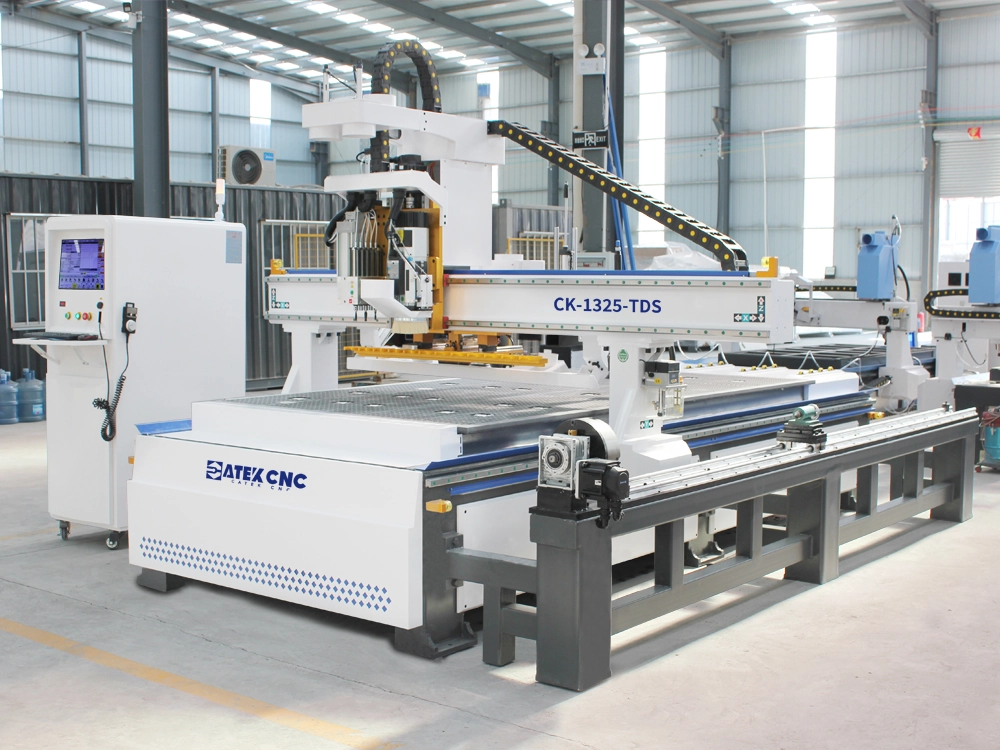 Front left view of linear ATC CNC nesting machine with 5+4 pneumatic drilling unit and 3D rotary axis
