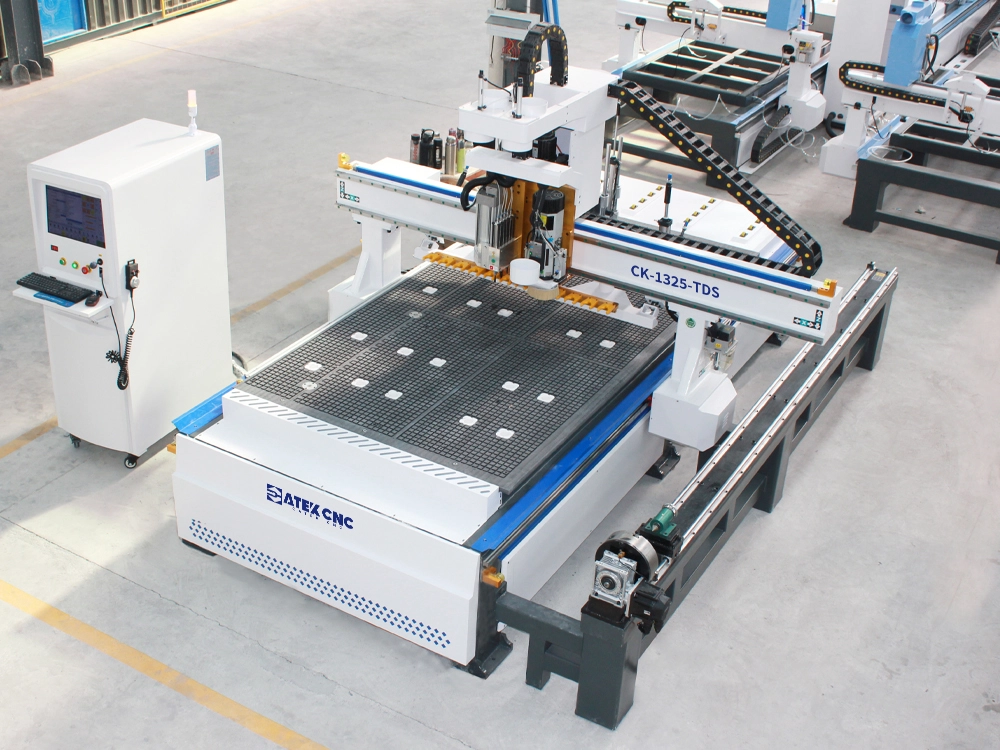 Topview of linear ATC CNC nesting machine with 5+4 pneumatic drilling unit and 3D rotary axis