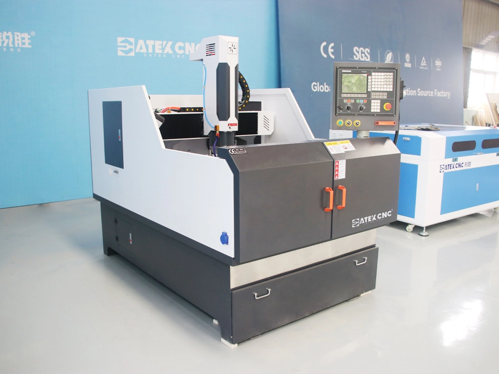 CNC metal router with automatic tool changing