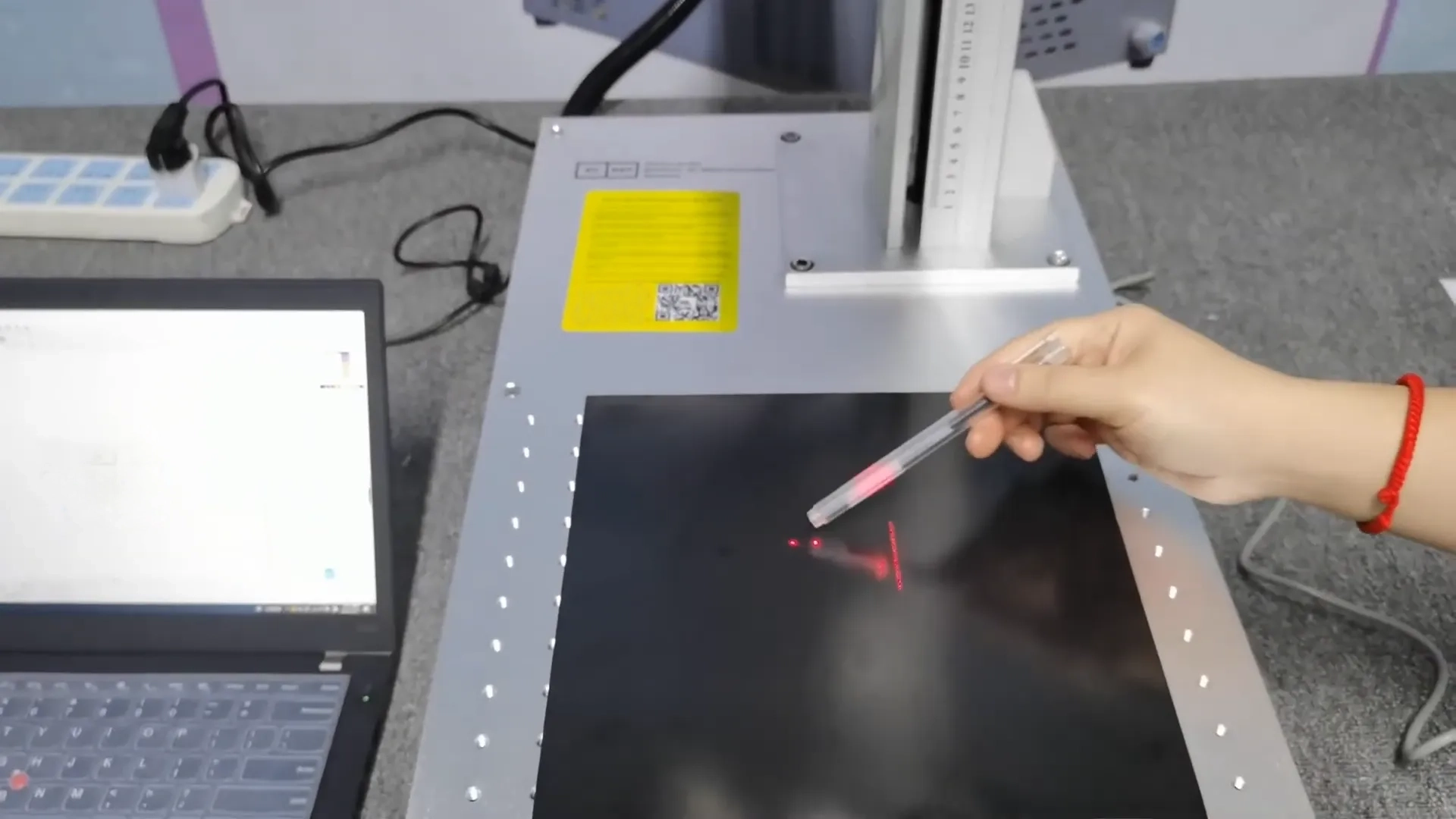 Observe whether the two light points coincide